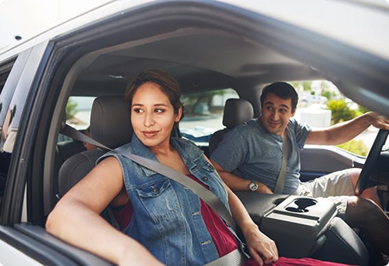 a man and woman in a car