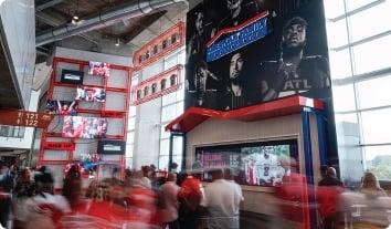 a large crowd of people in a mall