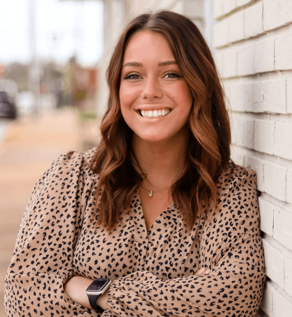 a woman smiling at the camera