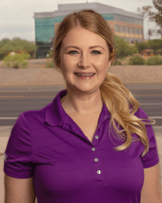 a woman smiling for the camera