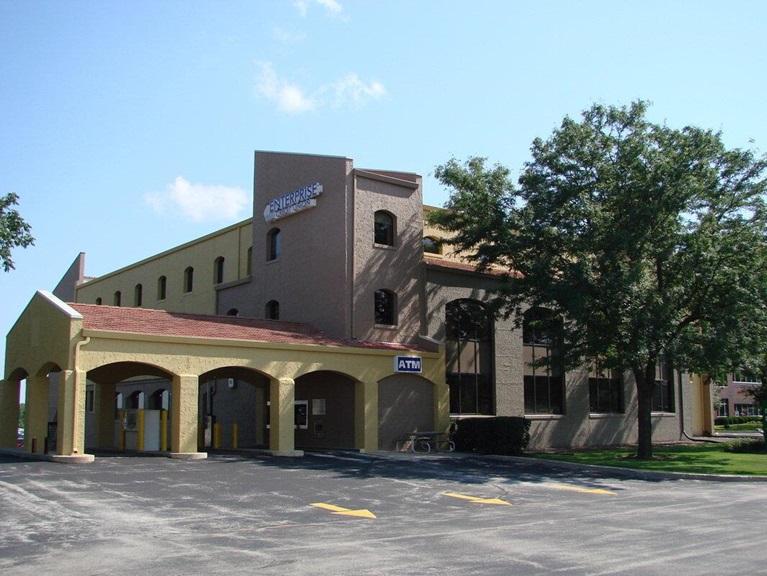 a building with a tree in front