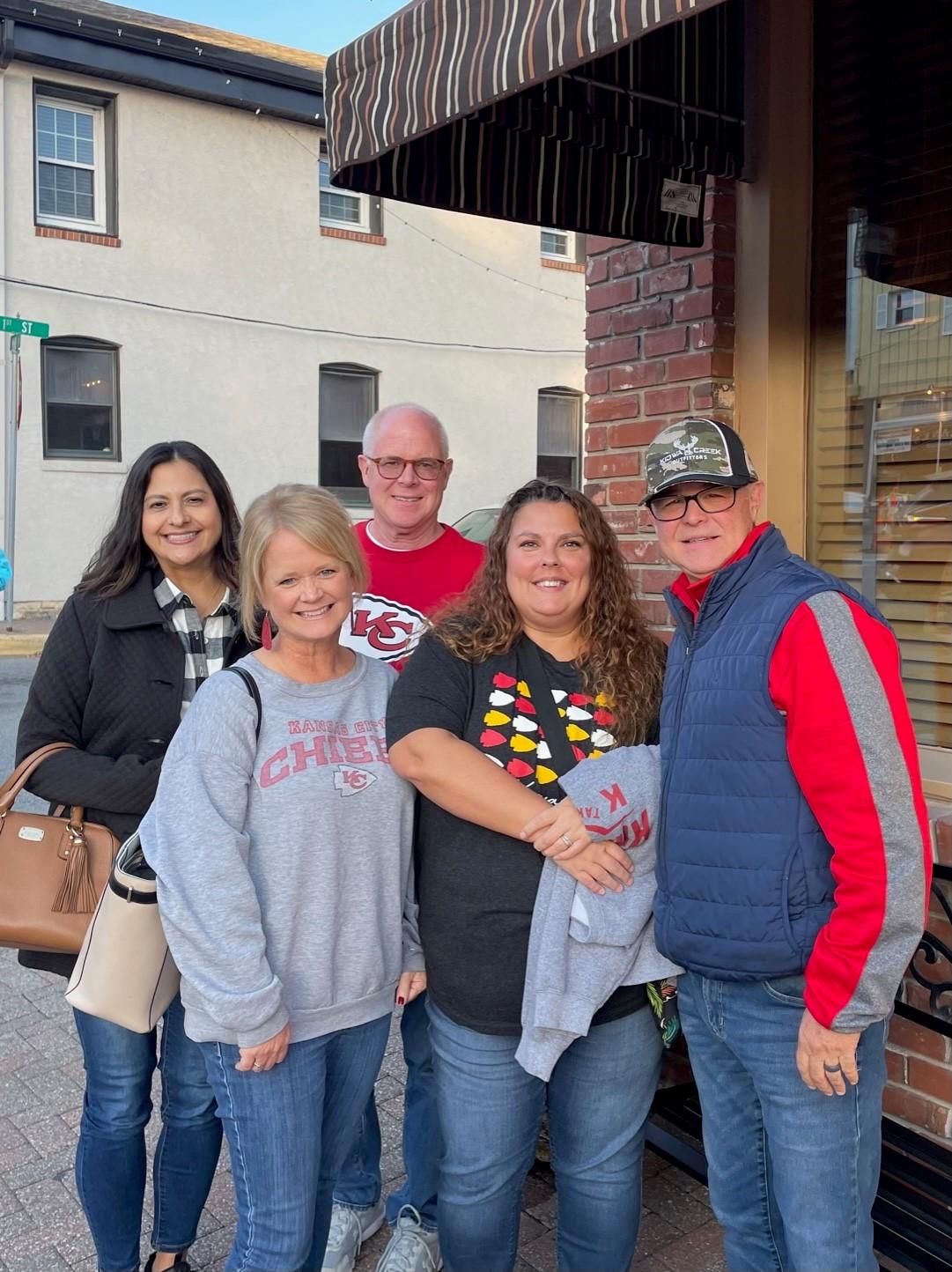 a group of people posing for a photo