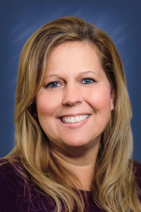 a close-up of a woman smiling