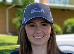 a woman wearing a baseball hat