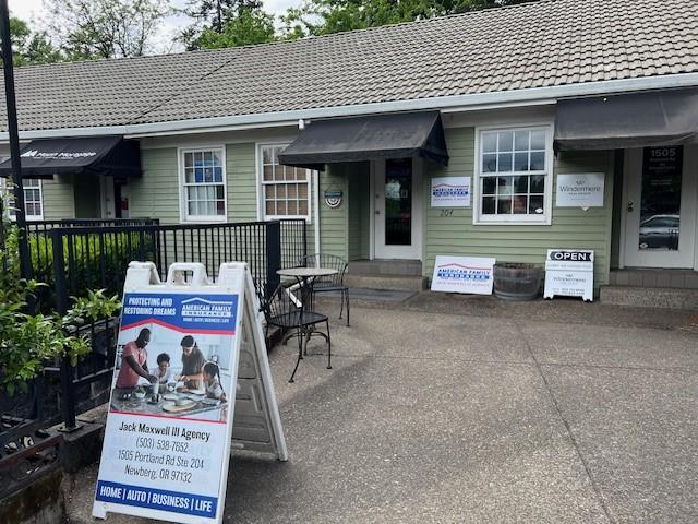 a house with a sign in front of it