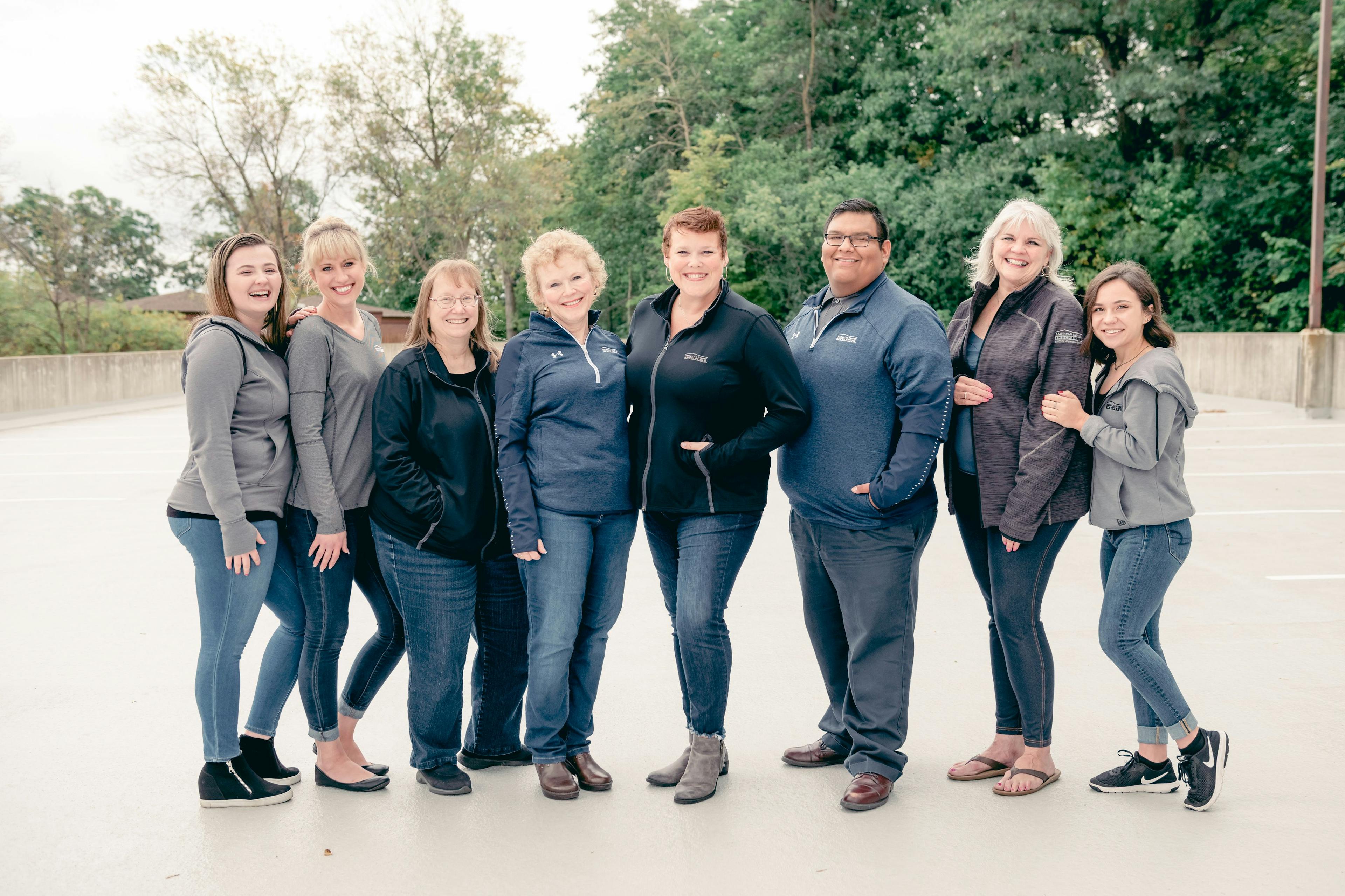 a group of people posing for a photo