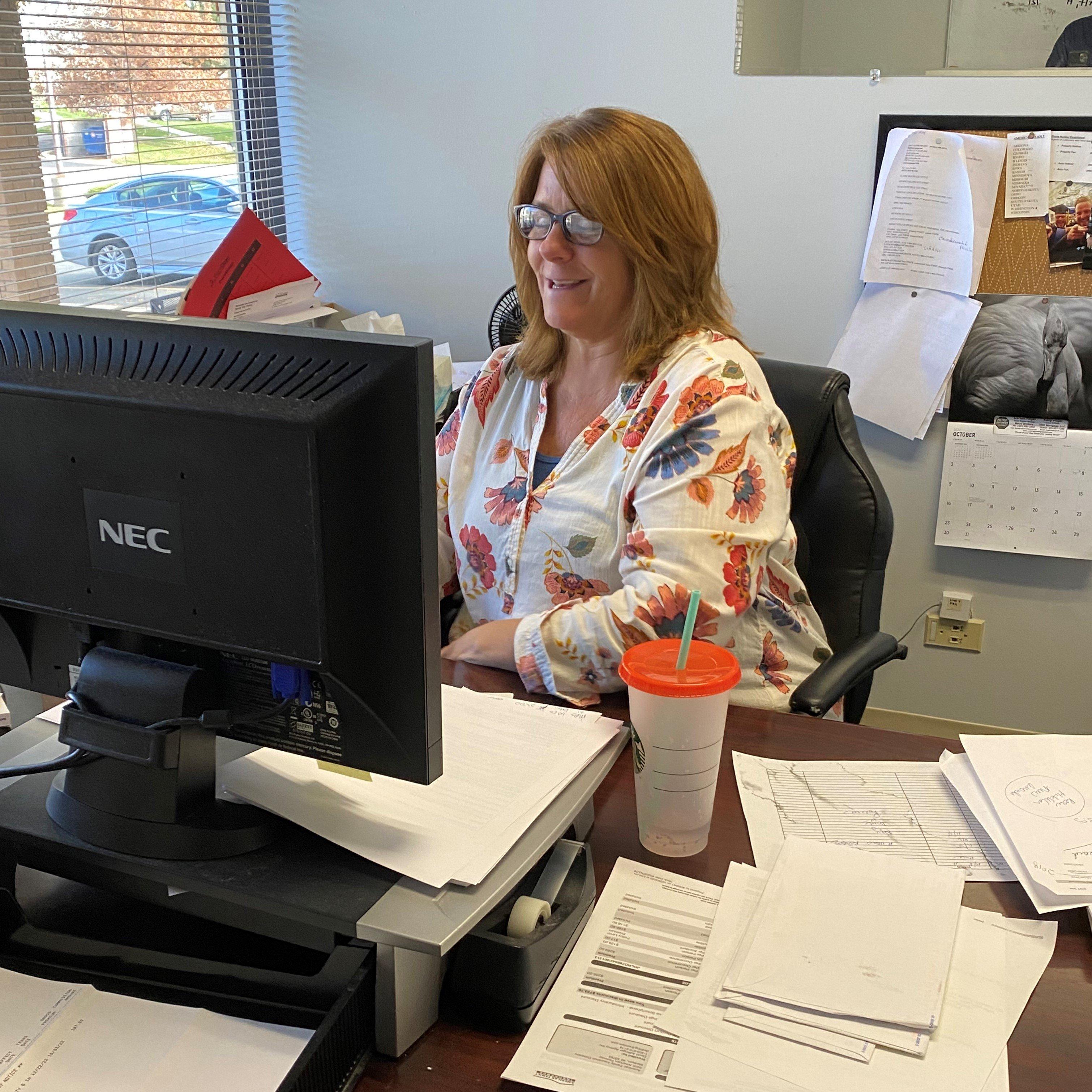 a person sitting at a desk