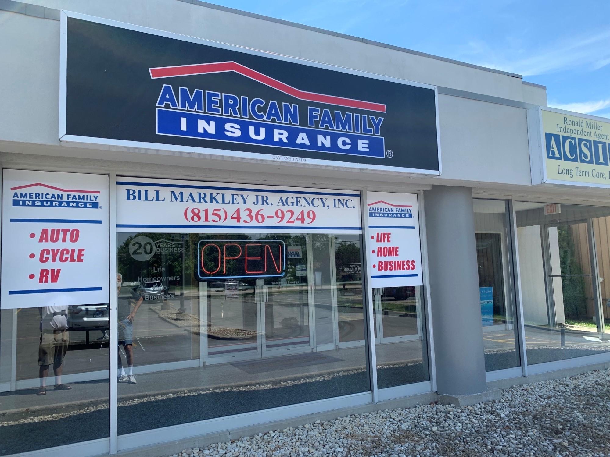 a store front with signs