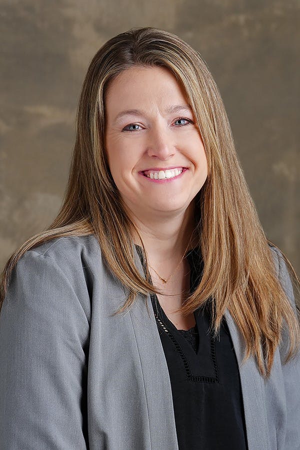 a woman smiling for the camera