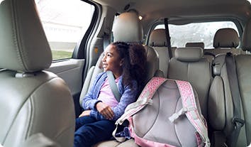 a person sitting in a car