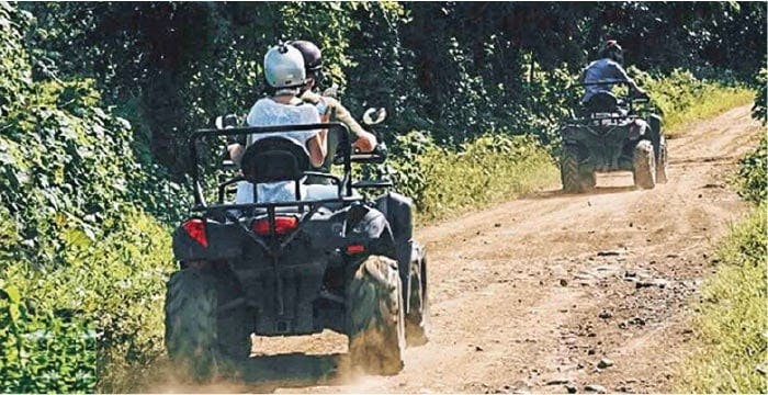 people riding on a vehicle