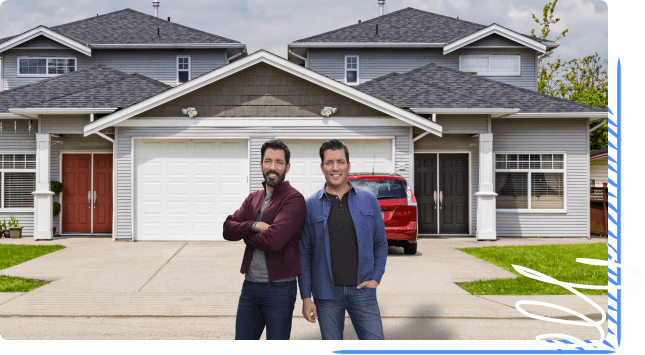 two men standing in front of a house